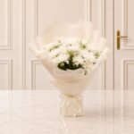 Wintry White flower arrangement in Lahore | Smilee