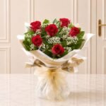 Six Stolen Kisses Red flower arrangement in Lahore | Smilee