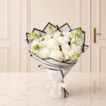 Wonderfully White flower arrangement in Lahore | Smilee