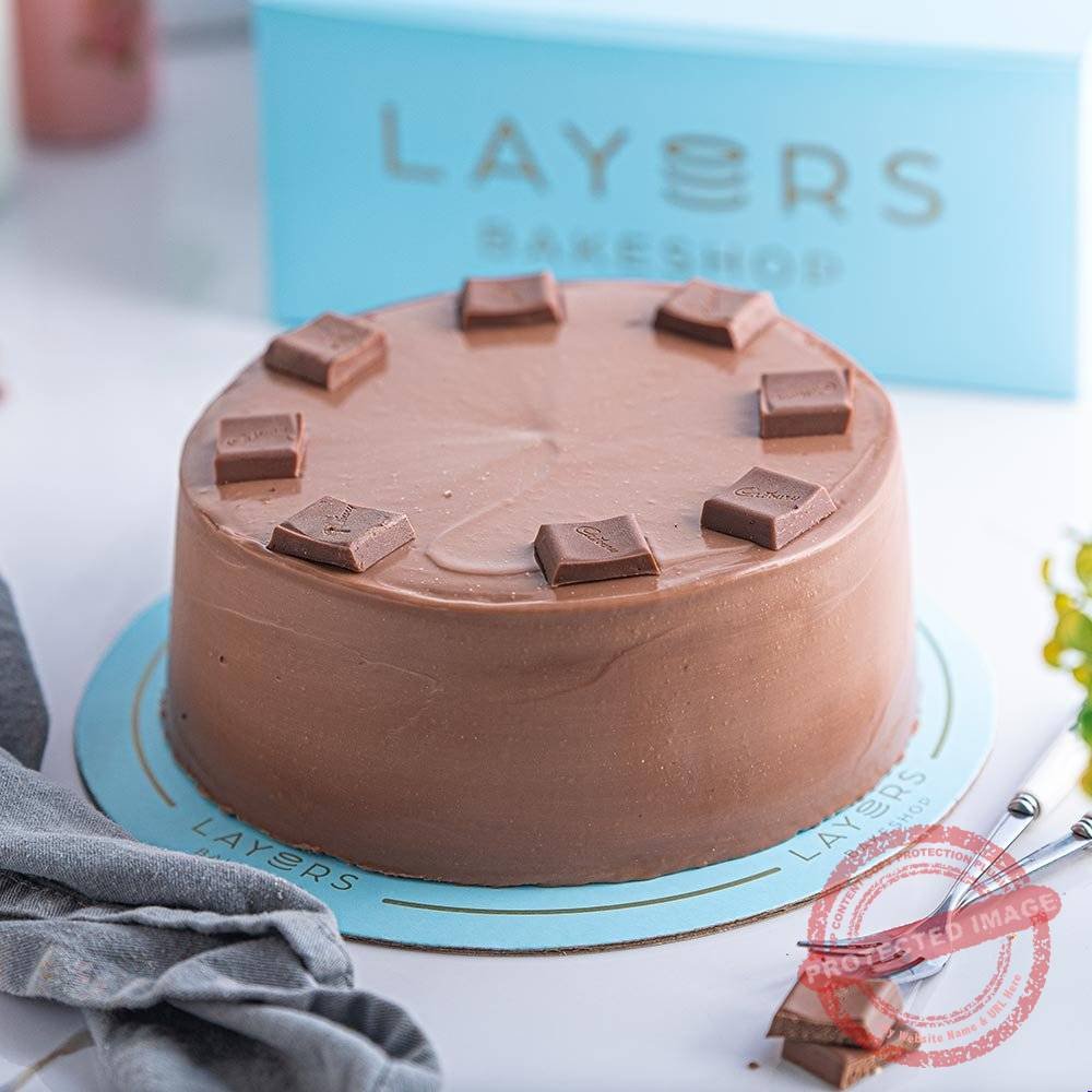 Dairy Milk Cake – Layers Bakeshop Cakes Dairy Milk Cake - Layers Bakeshop Cakes | Giftoo Pakistan